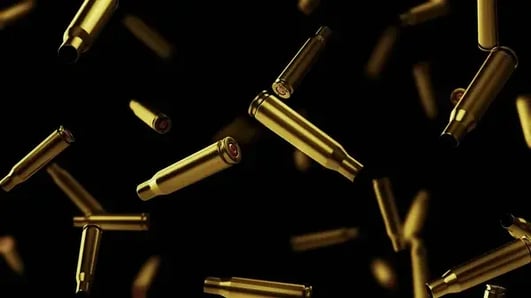 depositphotos_489102956-stock-photo-shot-casings-cartridge-caliber-black